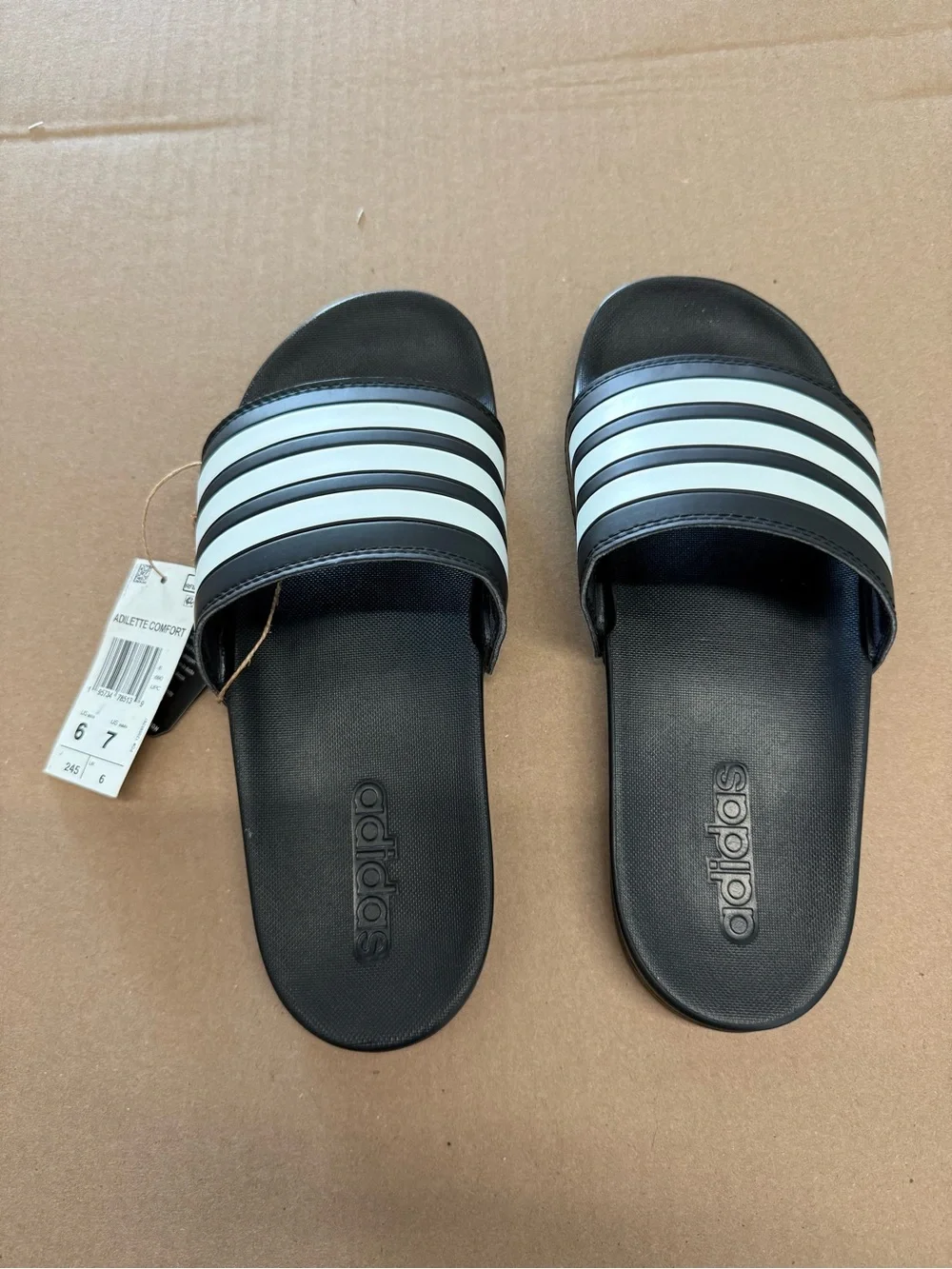 Adidas Kids' Black Slide Sandals with White Stripes